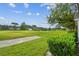 Picturesque view overlooking the lush green golf course, offering a serene and scenic backdrop at 1730 Stafford Springs Blvd, Mount Dora, FL 32757