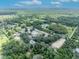 Aerial view of the property showcasing its size and equestrian facilities at 2075 Genova Dr, Oviedo, FL 32765