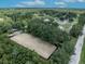 Aerial view showing property's extensive equestrian facilities at 2075 Genova Dr, Oviedo, FL 32765