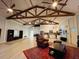 Open living space with high ceilings and exposed beams at 2075 Genova Dr, Oviedo, FL 32765