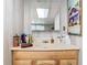 Bathroom vanity with mirror and ample counter space at 290 Valencia Rd, Debary, FL 32713