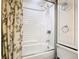 Bathroom with shower/tub combo and floral curtain at 290 Valencia Rd, Debary, FL 32713