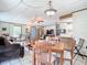 Cozy dining area adjacent to the living room and kitchen at 290 Valencia Rd, Debary, FL 32713