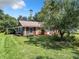 Cute ranch home with stone accents and a spacious yard at 290 Valencia Rd, Debary, FL 32713