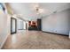 Open living area featuring tile flooring flowing to the kitchen at 349 La Creek Ct, Debary, FL 32713