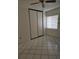 Bedroom with tiled floors and sliding doors at 11 Escondido Cir # 105, Altamonte Springs, FL 32701