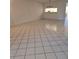 Bright dining room with tile floors and kitchen access at 11 Escondido Cir # 105, Altamonte Springs, FL 32701