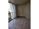 Enclosed balcony with tiled floor and storage at 11 Escondido Cir # 105, Altamonte Springs, FL 32701