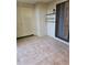 Small tiled patio with sliding door access at 11 Escondido Cir # 105, Altamonte Springs, FL 32701