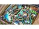 Aerial view of a vibrant water park with slides, pools, and lazy river at 8149 Surf St, Kissimmee, FL 34747