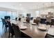Open floor plan featuring an expansive dining area, living room, and modern kitchen at 8844 Corcovado Dr, Kissimmee, FL 34747