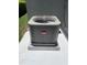 Exterior image shows a Bryant air conditioning unit with metal grate against neutral-colored wall at 14460 Clarkson Dr, Orlando, FL 32828