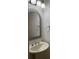Bathroom with decorative framed mirror and pedestal sink at 14460 Clarkson Dr, Orlando, FL 32828