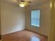 Cozy bedroom with natural light and wood-look floors at 14460 Clarkson Dr, Orlando, FL 32828