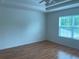 Spacious bedroom with ceiling fan and natural light at 14460 Clarkson Dr, Orlando, FL 32828
