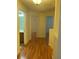 Hallway with doors leading to different rooms at 14460 Clarkson Dr, Orlando, FL 32828