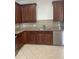 Kitchen with stainless steel appliances, cabinets, tile backsplash, and granite countertops at 14460 Clarkson Dr, Orlando, FL 32828