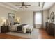 Comfortable bedroom with a plush bed, window, and contemporary furnishings at 14460 Clarkson Dr, Orlando, FL 32828