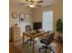 Stylish home office with a desk, chairs, and ample natural light at 14460 Clarkson Dr, Orlando, FL 32828