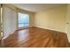 Bedroom with window and sliding glass doors to balcony area with wood floor at 2432 Lemon Tree Ln # B, Orlando, FL 32839