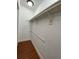 Walk-in closet with wood floor features white walls and shelving for storage at 2432 Lemon Tree Ln # B, Orlando, FL 32839