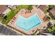 Aerial view of the pool features lounge chairs and well-maintained landscaping at 2432 Lemon Tree Ln # B, Orlando, FL 32839