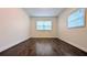 Bedroom featuring natural light and dark, gleaming hardwood flooring at 2819 Pembrook Dr, Orlando, FL 32810