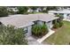 Charming single-story home with well-maintained landscaping and a welcoming front entrance at 2819 Pembrook Dr, Orlando, FL 32810