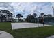 Outdoor basketball court with surrounding green space at 6147 Sunnyvale Dr, Orlando, FL 32822