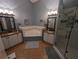 Spacious bathroom with corner jacuzzi tub and double vanity at 6147 Sunnyvale Dr, Orlando, FL 32822