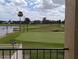 View of the golf course from a balcony at 6147 Sunnyvale Dr, Orlando, FL 32822