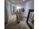 Hallway with stairs and mirror at 6147 Sunnyvale Dr, Orlando, FL 32822