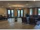 Elegant lobby with comfortable seating and chandelier at 6147 Sunnyvale Dr, Orlando, FL 32822