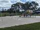 playground with swings and play structure at 6147 Sunnyvale Dr, Orlando, FL 32822