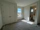 Spacious bedroom with ensuite bathroom and a view at 10257 Medawar St, Orlando, FL 32827