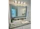 Bathroom featuring gray granite countertops, modern lighting, and decorative fixtures at 17271 E Peggy Ave. Ave, Mount Dora, FL 32757