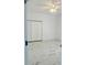 Bright and airy bedroom with tile flooring and ceiling fan at 17271 E Peggy Ave. Ave, Mount Dora, FL 32757