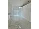 Dining area with marble flooring, neutral walls, and a modern chandelier at 17271 E Peggy Ave. Ave, Mount Dora, FL 32757