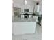 A chef's dream; kitchen features granite countertops, white cabinets, and stainless steel appliances at 17271 E Peggy Ave. Ave, Mount Dora, FL 32757