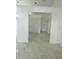 Open living room with marble flooring, neutral walls, and recessed lighting at 17271 E Peggy Ave. Ave, Mount Dora, FL 32757