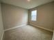 Spacious bedroom with neutral walls and carpeted floors at 2463 Francisco Art Ct, Oviedo, FL 32765