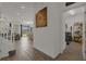 Clean hallway leading to the laundry and living areas at 1116 Hendon Loop, Davenport, FL 33837