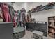 Large walk-in closet with ample storage shelving and drawers at 1116 Hendon Loop, Davenport, FL 33837