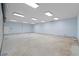 Vast storage with high ceilings and ample lighting, perfect for storing equipment or setting up a workshop at 17577 Davenport Rd, Winter Garden, FL 34787