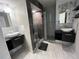 Luxurious bathroom with dual vessel sinks, a walk-in shower, and stylish design at 2649 Crown Ct # 2649, Kissimmee, FL 34741
