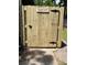 New wooden gate and decorative hardware at 2649 Crown Court at 2649 Crown Ct # 2649, Kissimmee, FL 34741