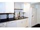 Modern kitchen features updated appliances and ample cabinet space at 2649 Crown Ct # 2649, Kissimmee, FL 34741