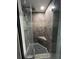 Custom shower with rain head, mosaic tile accents, and glass door at 2649 Crown Ct # 2649, Kissimmee, FL 34741