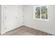Bright bedroom with double closet and natural light at 634 Burch Ave, Winter Garden, FL 34787