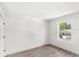Light bedroom featuring wood floors, natural light, and modern finishes at 634 Burch Ave, Winter Garden, FL 34787